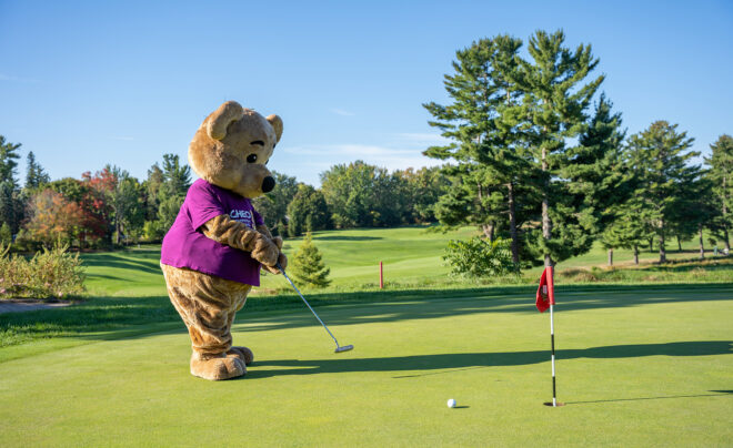 CHEO Bear golfing at the CHEO Charity Classic 2025